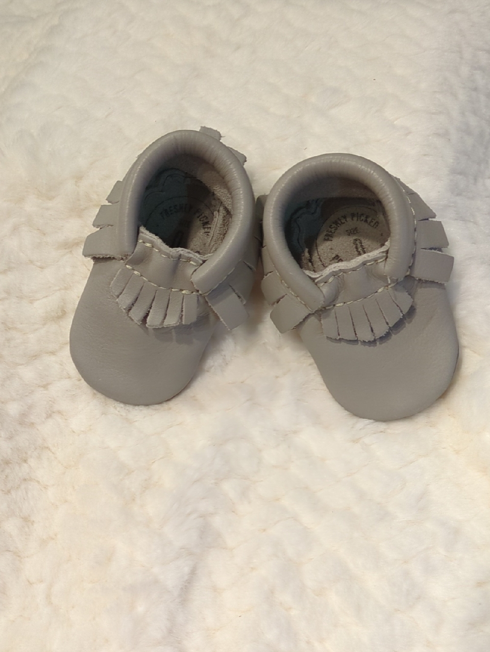 Freshly Picked Light Gray Fringe Baby Moccasins